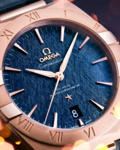 39 mm, Sedna™ gold on leather strap^OMEGA Fashion