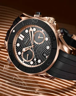 44 mm, Sedna™ gold on rubber strap^OMEGA Best